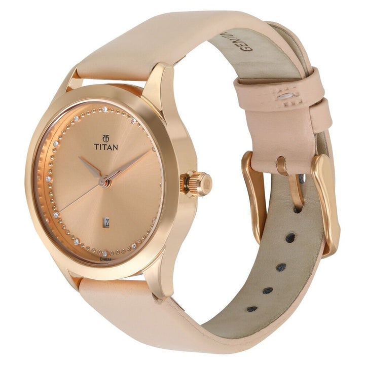 Titan Sparkle Pink Dial Analog with Date Leather Strap watch for Women NS2570WL01