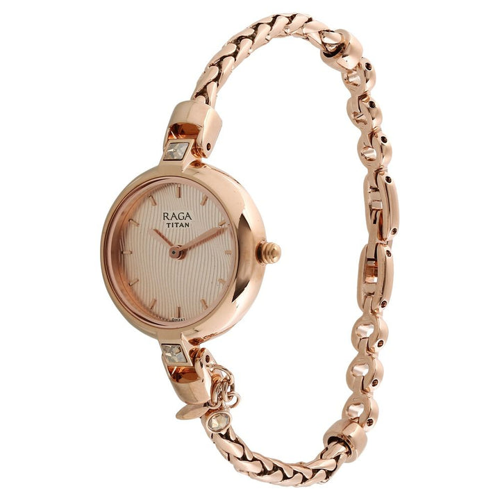 Titan Raga Espana Rose Gold Dial Women Watch With Metal Strap NS2584WM01