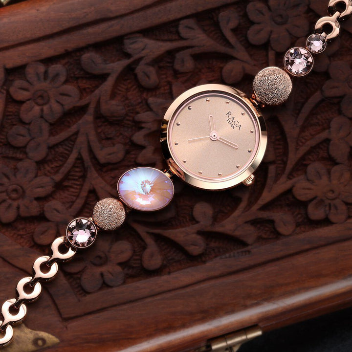 Raga Women's Charm: Elegant Mother of Pearl Dial with Ornate Strap Watch - The Watch Factory ®