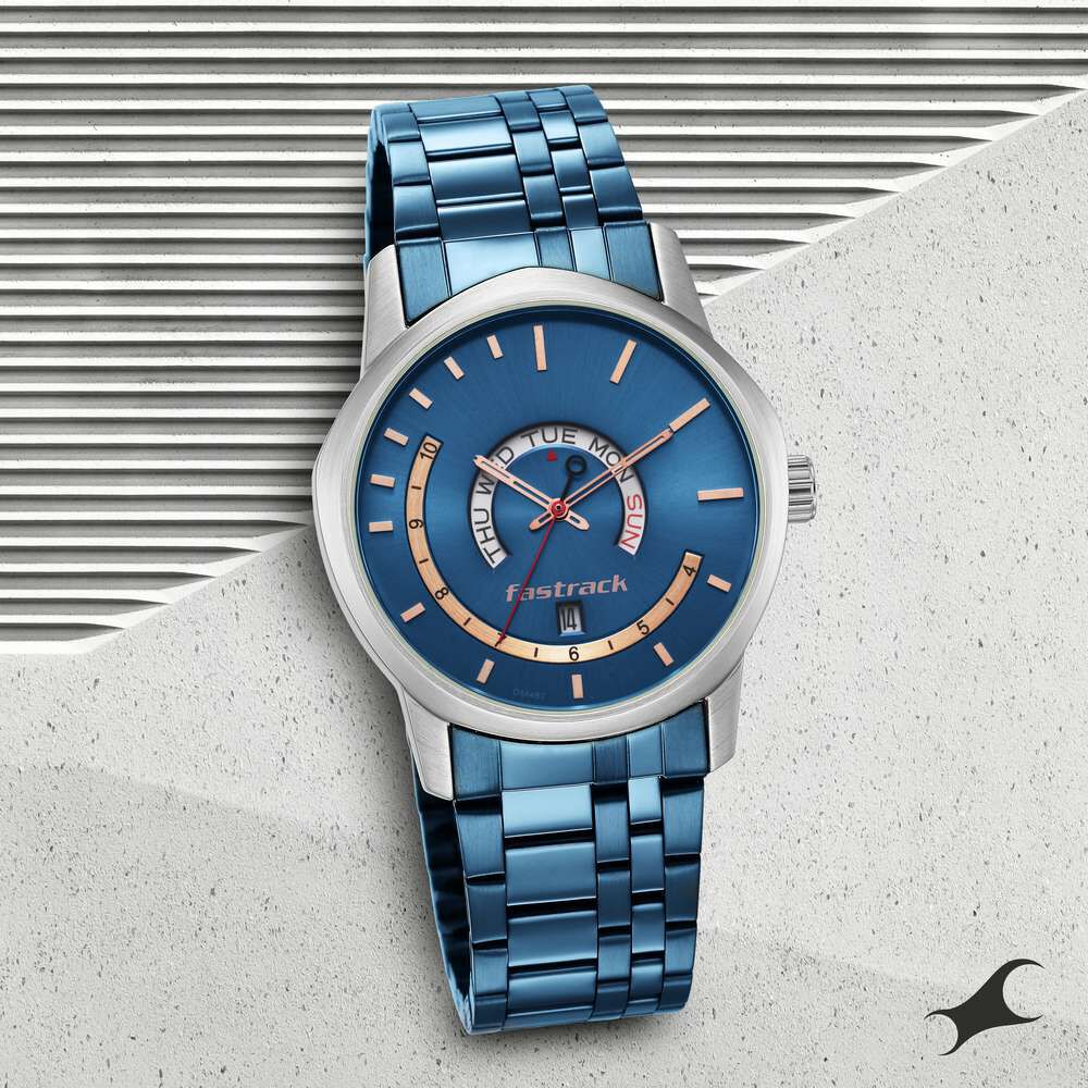 Fastrack Exuberant Quartz Analog with Day and Date Blue Dial Metal Strap Watch for Guys NR3279KM01