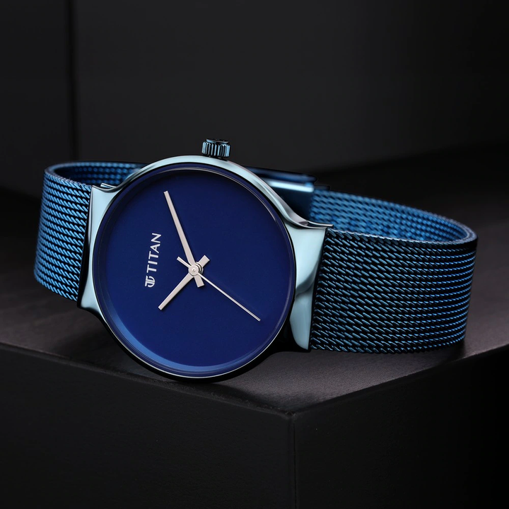 Titan 95162QM01 Purple Unending Beauty Analog Watch For Women