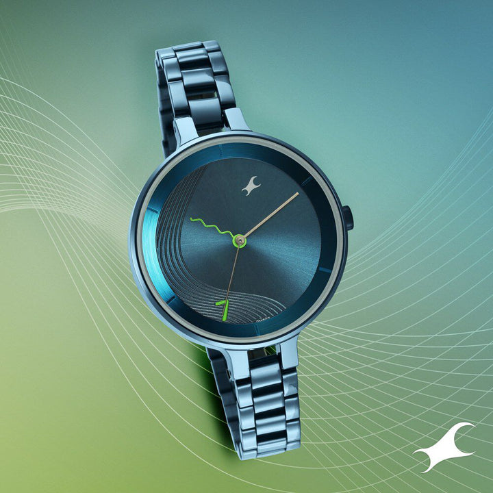 Fastrack Stunners Quartz Analog Blue Dial Metal Strap Watch for Girls NS6265QM01