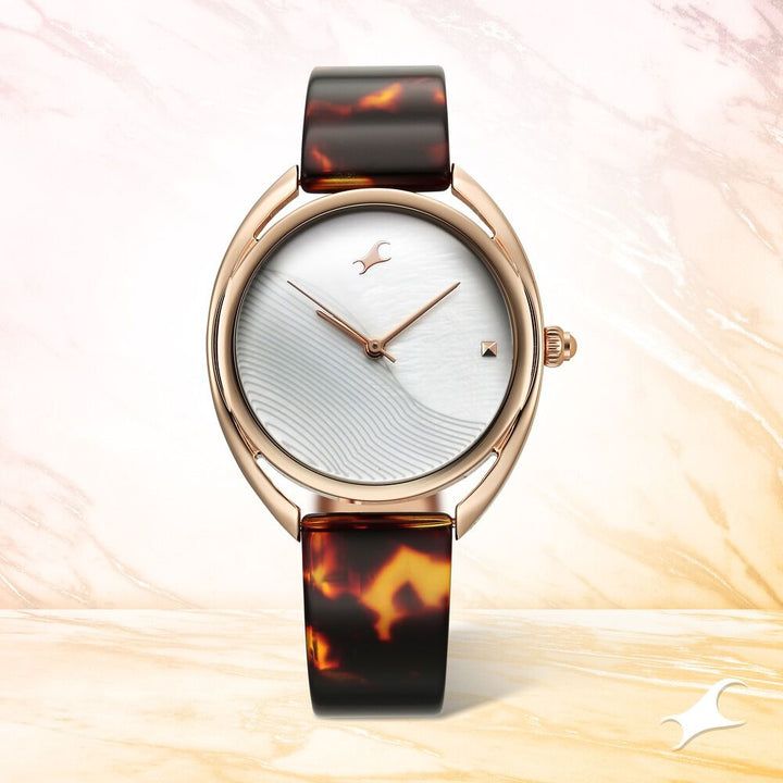 Fastrack Younique Quartz Analog Mother Of Pearl Dial Acetate And Metal Strap Watch For Girls 68036KD02