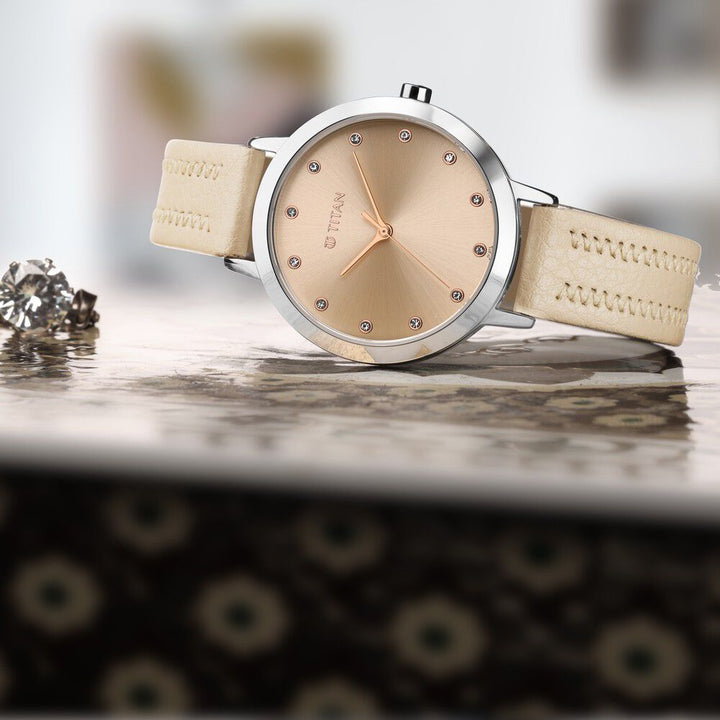 Titan Memento Beige Dial Analog Leather Strap Watch for Women NR95133SL02