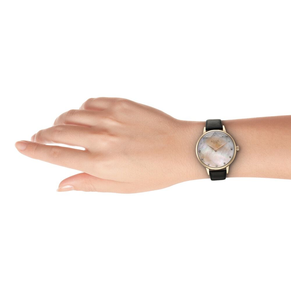 Titan Raga Showstopper Quartz Analog Mother Of Pearl Dial Leather Strap Watch for Women 95274WL02