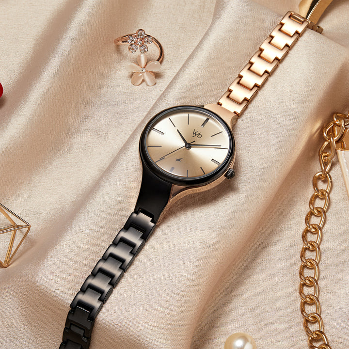 Fastrack Vyb Striker Quartz Analog Rose Gold Dial Metal Strap Watch for Girls FV60001KM02W