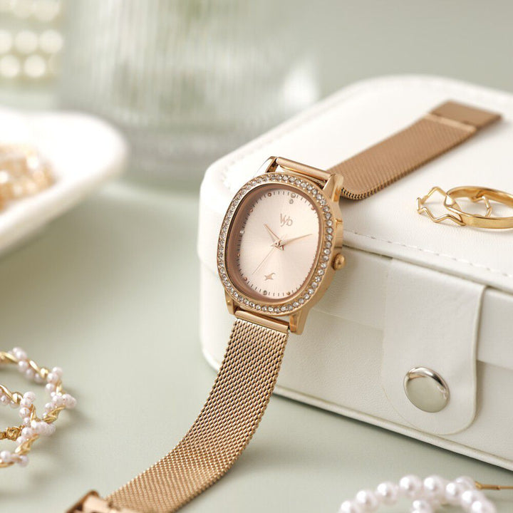 Fastrack Vyb Mirage Quartz Analog Rose Gold Dial Rose Gold Color Metal Strap Watch For Girls FV60049WM01W